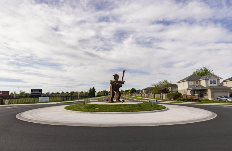 a youth pitching to Major League baseball player and hometown hero Jack Graney with his mascot dog was installed at Fairview Avenue and Southgate/Bill Martyn Parkway